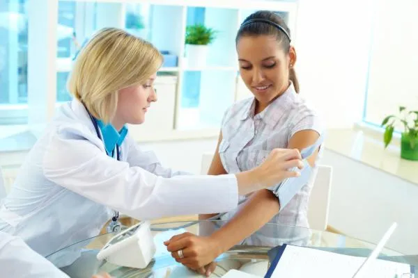 doctor treating patient